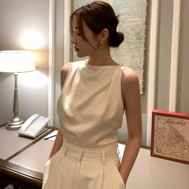 Ropa femenina sexy sin espalda para mujer 2025, top nuevo sin mangas con cuello redondo, camisetas y camisolas elegantes de verano