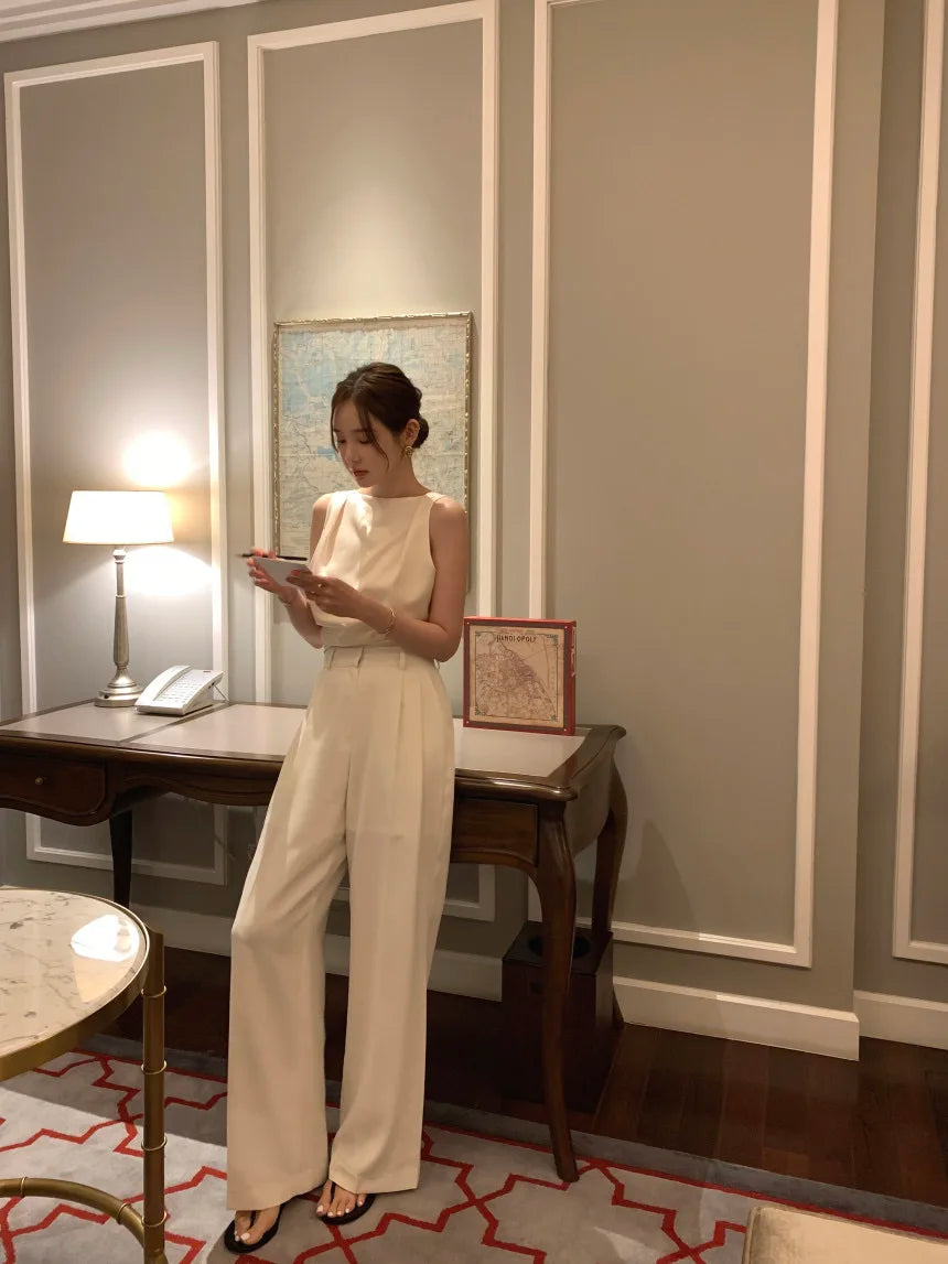 Ropa femenina sexy sin espalda para mujer 2025, top nuevo sin mangas con cuello redondo, camisetas y camisolas elegantes de verano